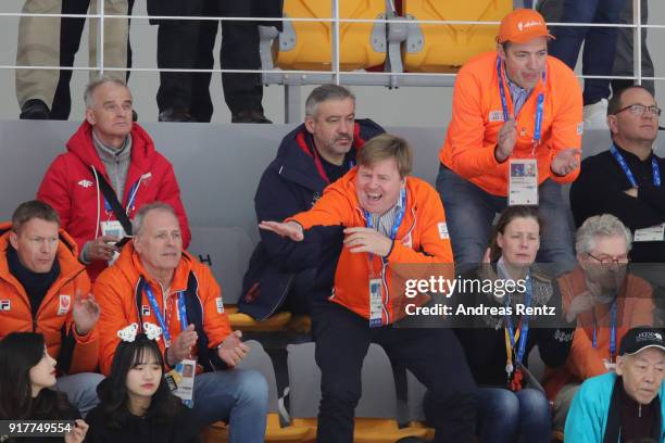 King Willem-Alexander of the Netherlands gestures during the race of Kjeld Nuis of the Netherlands during the Men's 1500m Speed Skating on day four...