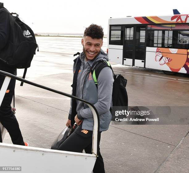 Alex Oxlade Chamberlain of Liverpool board the plane for their trip to Porto at Liverpool John Lennon Airport on February 13, 2018 in Liverpool,...