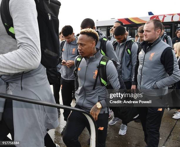 Nathaniel Clyne of Liverpool board the plane for their trip to Porto at Liverpool John Lennon Airport on February 13, 2018 in Liverpool, England.