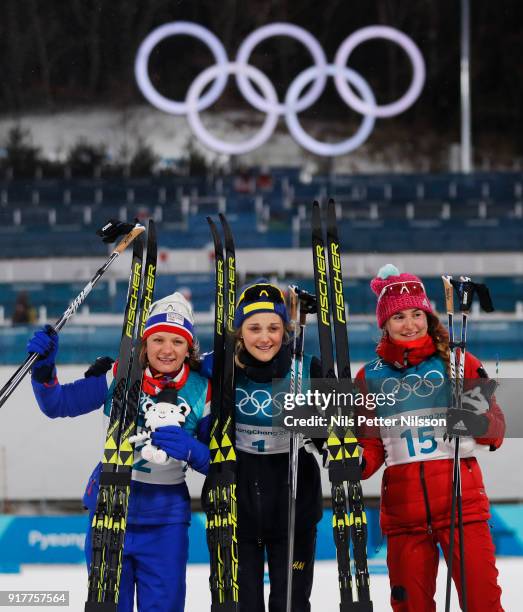 Maiken Caspersen Falla of Norway, Stina Nilsson of Sweden and Yulia Belorukova of Olympic Athletes of Russia on the podium during the Womens...