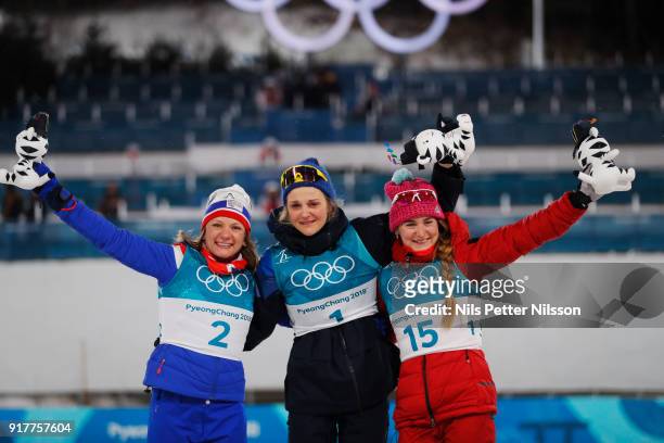 Maiken Caspersen Falla of Norway, Stina Nilsson of Sweden and Yulia Belorukova of Olympic Athletes of Russia on the podium during the Womens...