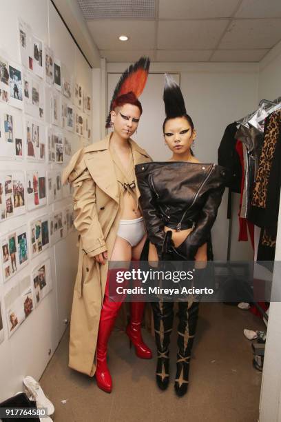 Models pose backstage during the Kaimin fashion show at the Glass Houses on February 12, 2018 in New York City.