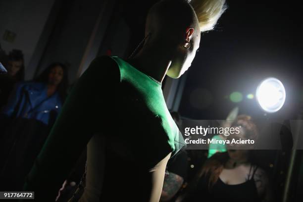 Model prepares backstage during the Kaimin fashion show at the Glass Houses on February 12, 2018 in New York City.