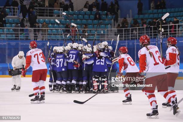 Team United States celebrates defeating Team Olympic Athletes from Russia 5-0 in the Women's Ice Hockey Preliminary Round - Group A game on day four...