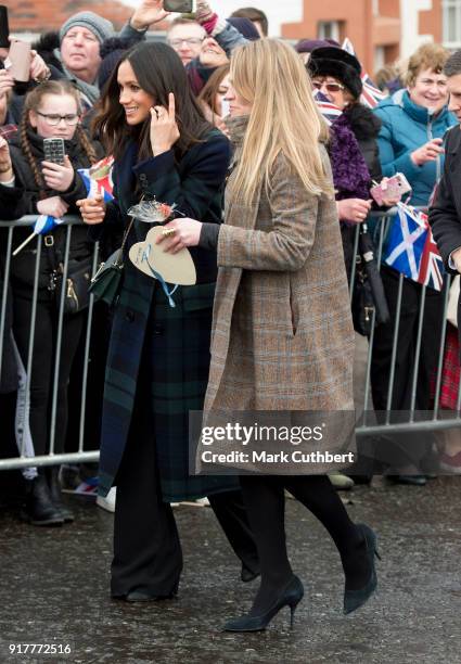 Meghan Markle accompanied by Amy Pickerill visits Edinburgh Castle on February 13, 2018 in Edinburgh, Scotland.