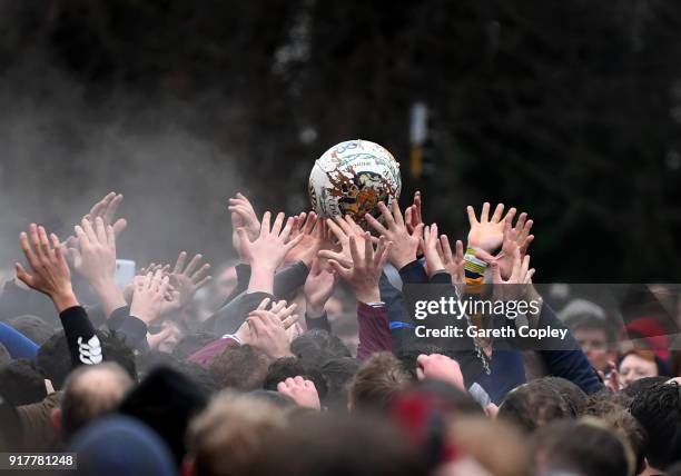 Rival teams 'Up'ards' and 'Down'ards' battle for the ball during the Royal Shrovetide Football match in Ashbourne, Derbyshire, England on February...