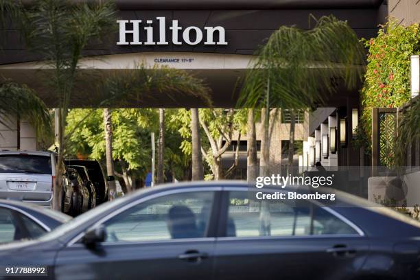 Signage is displayed outside the Hilton Pasadena hotel in Pasadena, California, U.S., on Monday, Feb. 12, 2018. Hilton Worldwide Holdings Inc. Is...