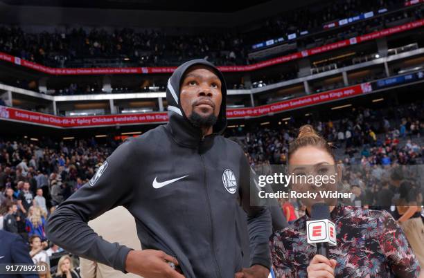 Kevin Durant of the Golden State Warriors speaks with Cassidy Hubbarth after defeating the Sacramento Kings on February 2, 2018 at Golden 1 Center in...