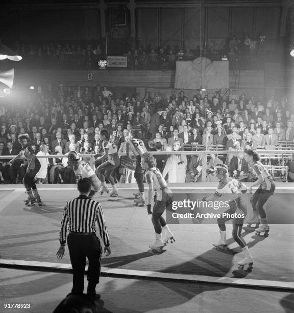 Competitors in a roller derby, USA, 1950.