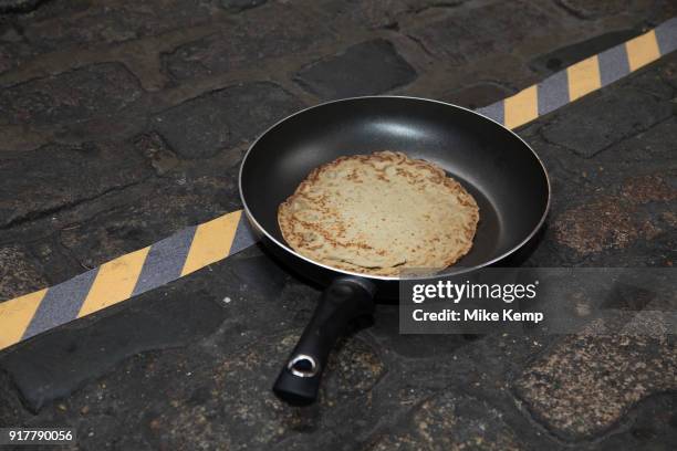 Shrove Tuesday festivities as competitors line up for the Leadenhall Market Pancake Day Race on 13th February 2018 in London, United Kingdom....