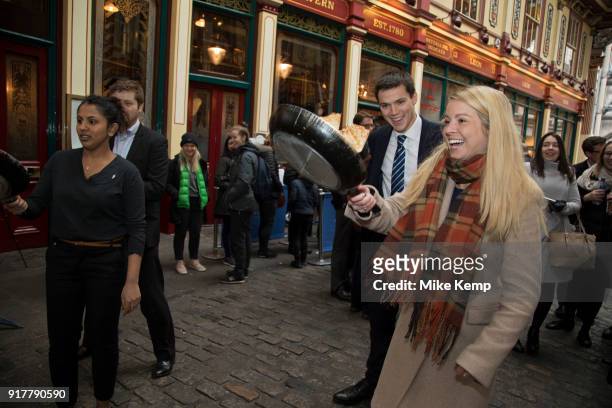 Shrove Tuesday festivities as competitors line up for the Leadenhall Market Pancake Day Race on 13th February 2018 in London, United Kingdom....