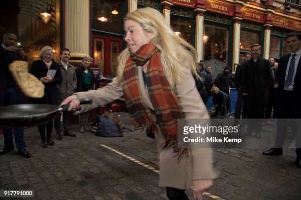 Shrove Tuesday festivities as competitors line up for the Leadenhall Market Pancake Day Race on 13th February 2018 in London, United Kingdom....