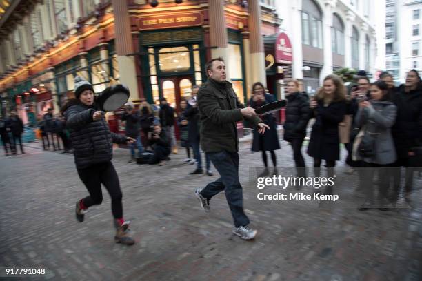 Shrove Tuesday festivities as competitors line up for the Leadenhall Market Pancake Day Race on 13th February 2018 in London, United Kingdom....