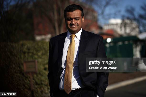 Principal Deputy White House Press Secretary Raj Shah on his way back to the West Wing after a TV interview at the White House February 13, 2018 in...