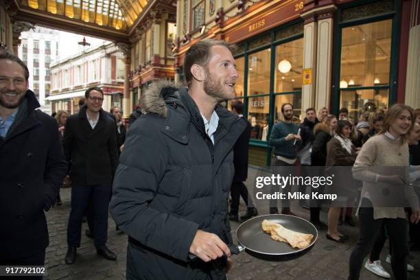 Shrove Tuesday festivities as The City Flippers, celebrate winning the Leadenhall Market Pancake Day Race on 13th February 2018 in London, United...