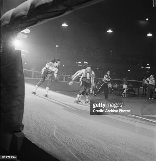 Competitors in a roller derby, USA, 1950.