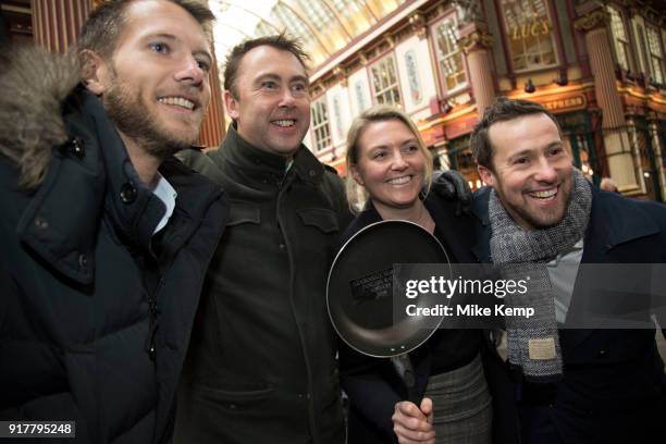 Shrove Tuesday festivities as The City Flippers, celebrate winning the Leadenhall Market Pancake Day Race on 13th February 2018 in London, United...