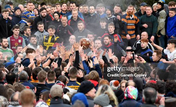 Rival teams 'Up'ards' and 'Down'ards' battle for the ball during the Royal Shrovetide Football match in Ashbourne, Derbyshire, England on February...