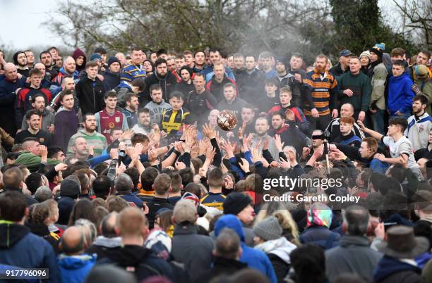 Rival teams 'Up'ards' and 'Down'ards' battle for the ball during the Royal Shrovetide Football match in Ashbourne, Derbyshire, England on February...