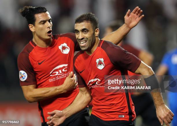 Qatar's Al-Rayyan SC's Moroccan forward Abderrazak Hamdallah celebrates after scoring a goal against Iran's Esteghlal FC, during their Asian...