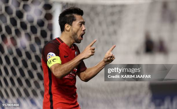 Qatar's Al-Rayyan SC's Qatari-Brazilian midfielder and captain Rodrigo Tabata celebrates after scoring a goal against Iran's Esteghlal FC, during...