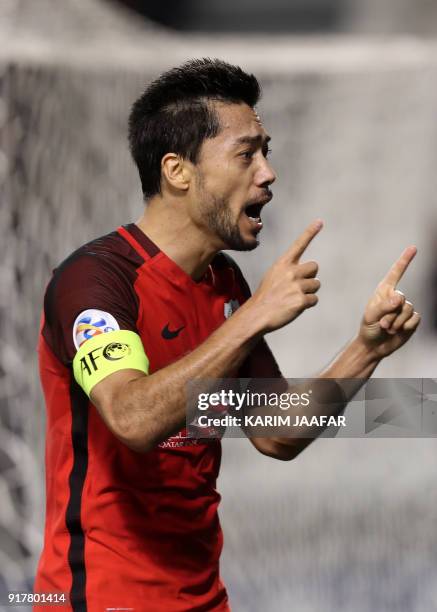 Qatar's Al-Rayyan SC's Qatari-Brazilian midfielder and captain Rodrigo Tabata celebrates after scoring a goal against Iran's Esteghlal FC, during...