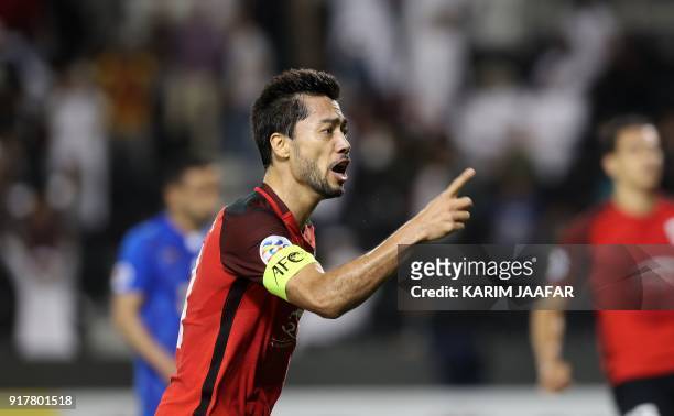Qatar's Al-Rayyan SC's Qatari-Brazilian midfielder and captain Rodrigo Tabata celebrates after scoring a goal against Iran's Esteghlal FC, during...