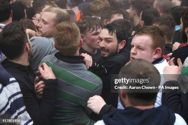Players during the annual Royal Shrovetide football match in Ashbourne, Derbyshire which takes place over two eight-hour periods, on Shrove Tuesday...