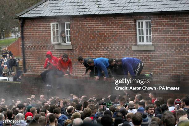 Players during the annual Royal Shrovetide football match in Ashbourne, Derbyshire which takes place over two eight-hour periods, on Shrove Tuesday...