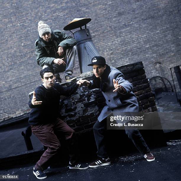 From left, American rappers Ad-Rock , MCA and Mike D , of the group the Beastie Boys, pose on a rooftop, New York, New York, 1994.