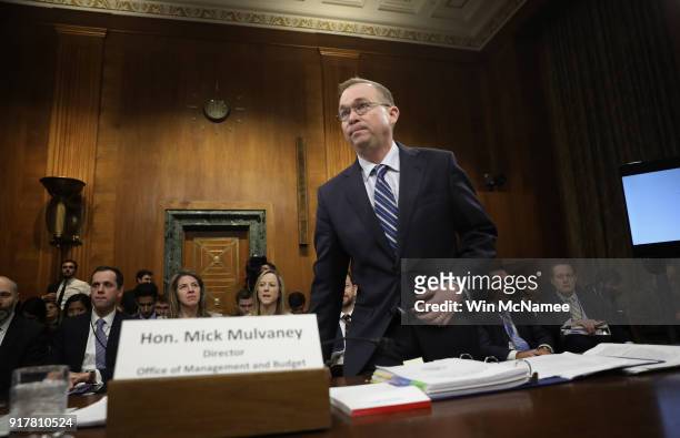 Office of Management and Budget Director Mick Mulvaney arrives for testimony before the Senate Budget Committee February 13, 2018 in Washington, DC....