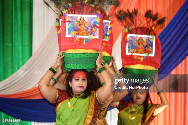 Marathi women perform a folk dance protesting against female infanticide in India and dedicated to the Goddess Durga and the empowerment of women and...