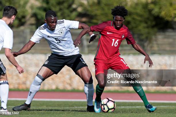 Kevin Bukusu of Germany U17 challenges Felix Correia of Portugal U17 during U17-Juniors Algarve Cup match between U17 Portugal and U17 Germany at...