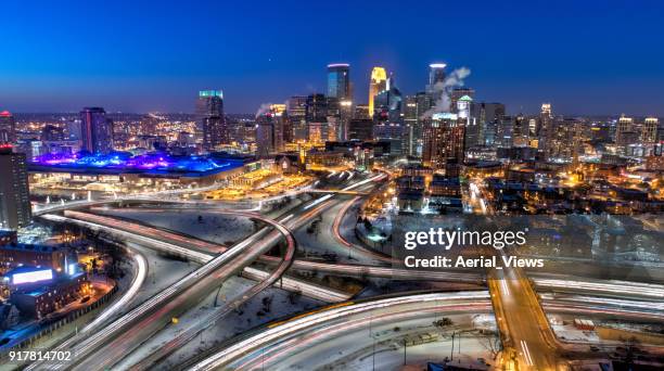 minneapolis skyline at night - minneapolis winter stock pictures, royalty-free photos & images