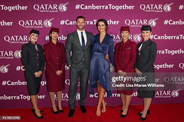 Kris Smith and Sara Boulazeris pose with Qatar Airways crew during the Qatar Airways Canberra Launch gala dinner on February 13, 2018 in Canberra,...