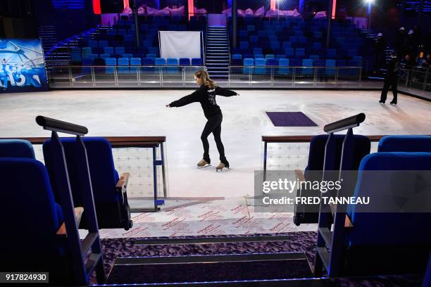 Woman practices on an ice rink inside US shipowner Royal Caribbeans new Oasis-class cruise ship, Symphony of the Seas, the largest passenger ship...