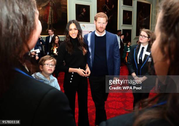 Prince Harry and Meghan Markle attend a reception for young people at the Palace of Holyroodhouse on February 13, 2018 in Edinburgh, Scotland.