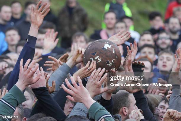 Players during the annual Royal Shrovetide football match in Ashbourne, Derbyshire which takes place over two eight-hour periods, on Shrove Tuesday...