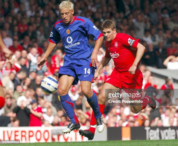 Steven Gerrard of Liverpool and Alan Smith of Manchester United in action during the Barclays Premiership match between Liverpool and Manchester...