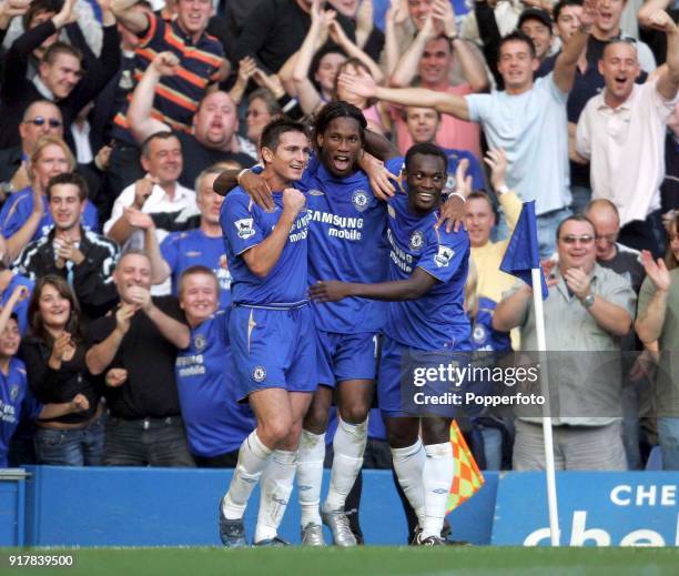 Frank Lampard, Didier Drogba and Michael Essien of Chelsea celebrate the third goal during the Barclays Premiership match between Chelsea and Bolton...