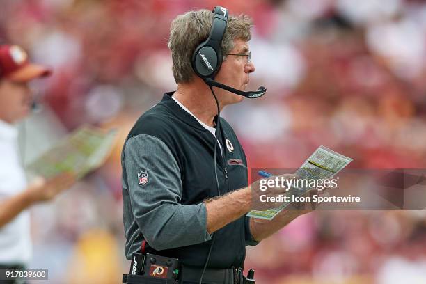 Washington Redskins Offensive Line coach Bill Callahan talks into his headset during a NFL football game between the San Francisco 49ers and the...