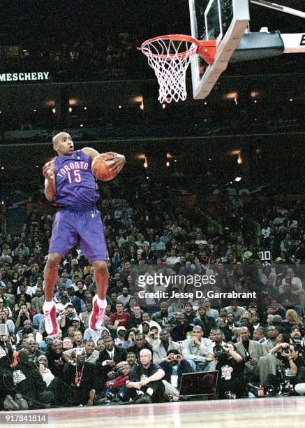 Vince Carter of the Toronto Raptors goes for a dunk during the 2000 NBA All Star Slam Dunk Contest at The Arena In Oakland on February 12, 2000 in...