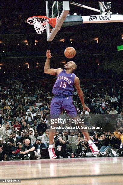 Vince Carter of the Toronto Raptors goes for a dunk during the 2000 NBA All Star Slam Dunk Contest at The Arena In Oakland on February 12, 2000 in...