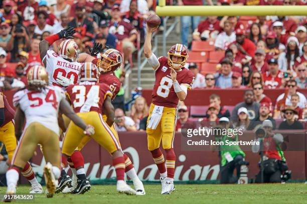 Washington Redskins quarterback Kirk Cousins throws the football to Washington Redskins wide receiver Byron Marshall during a NFL football game...