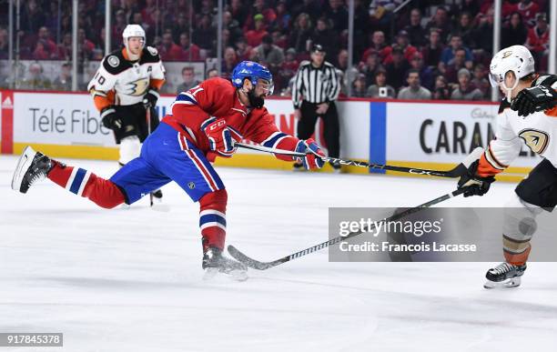 David Schlemko of the Montreal Canadiens fires a slap shot against the Anaheim Ducks in the NHL game at the Bell Centre on February 3, 2018 in...