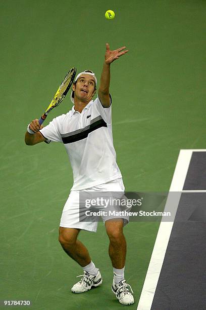 Richard Gasquet of France serves to David Ferrer of Spain during day two of the 2009 Shanghai ATP Masters 1000 at Qi Zhong Tennis Centre on October...