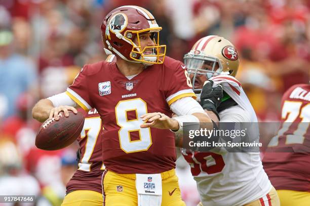 Washington Redskins quarterback Kirk Cousins looks to throw the football during a NFL football game between the San Francisco 49ers and the...