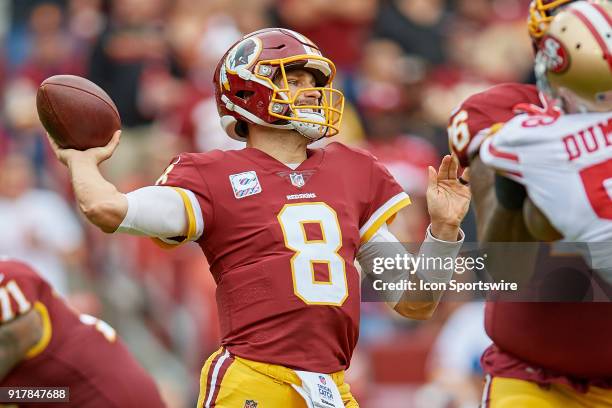 Washington Redskins quarterback Kirk Cousins looks to throw the football during a NFL football game between the San Francisco 49ers and the...