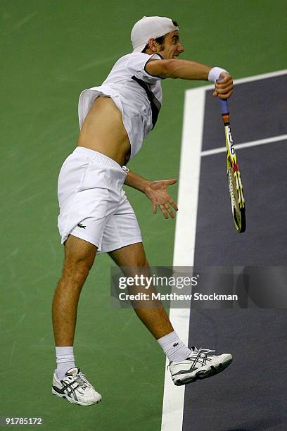 Richard Gasquet of France serves to David Ferrer of Spain during day two of the 2009 Shanghai ATP Masters 1000 at Qi Zhong Tennis Centre on October...