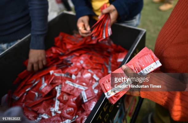 Free distribution of condoms as people gather to observe the International Condom Day 2018, an event organized by Aids Health care Foundation at...